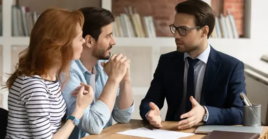 adults talking to a lawyer